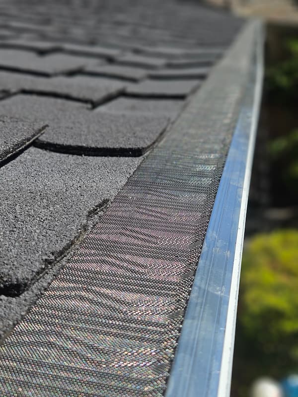 Micro-mesh gutter screen installation on a Sacramento home